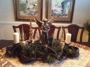 Table scape for the dining room table I created yesterday. I had the left over ribbon, garland, and candles.