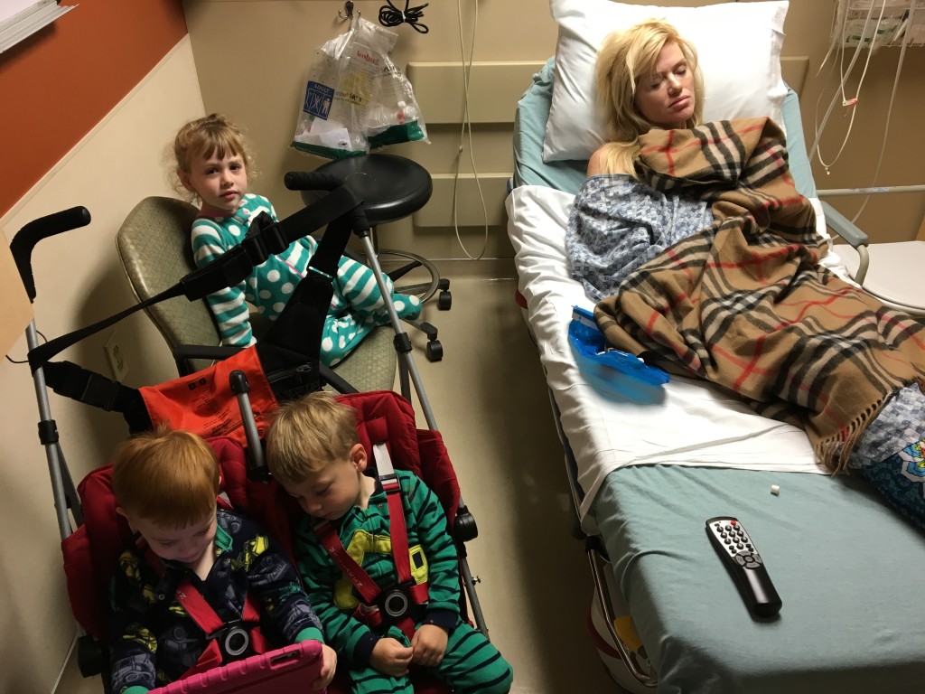 (As I was typing this blog entry my husband showed me his IPhone and look what he had! A pic of me and the kids at the ER. I find it amusing now, but I am sure I wouldn't have at that moment, had I known he was taking pics of me on a hospital gurney)